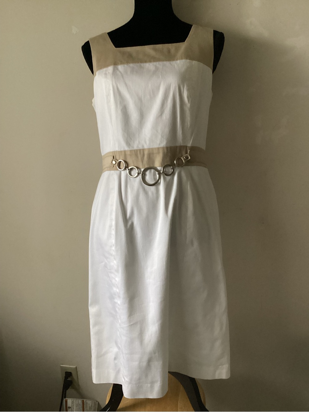 Chad Sleeveless cream Midi Sheath Dress with Beige Trim and Metallic-Link chain.